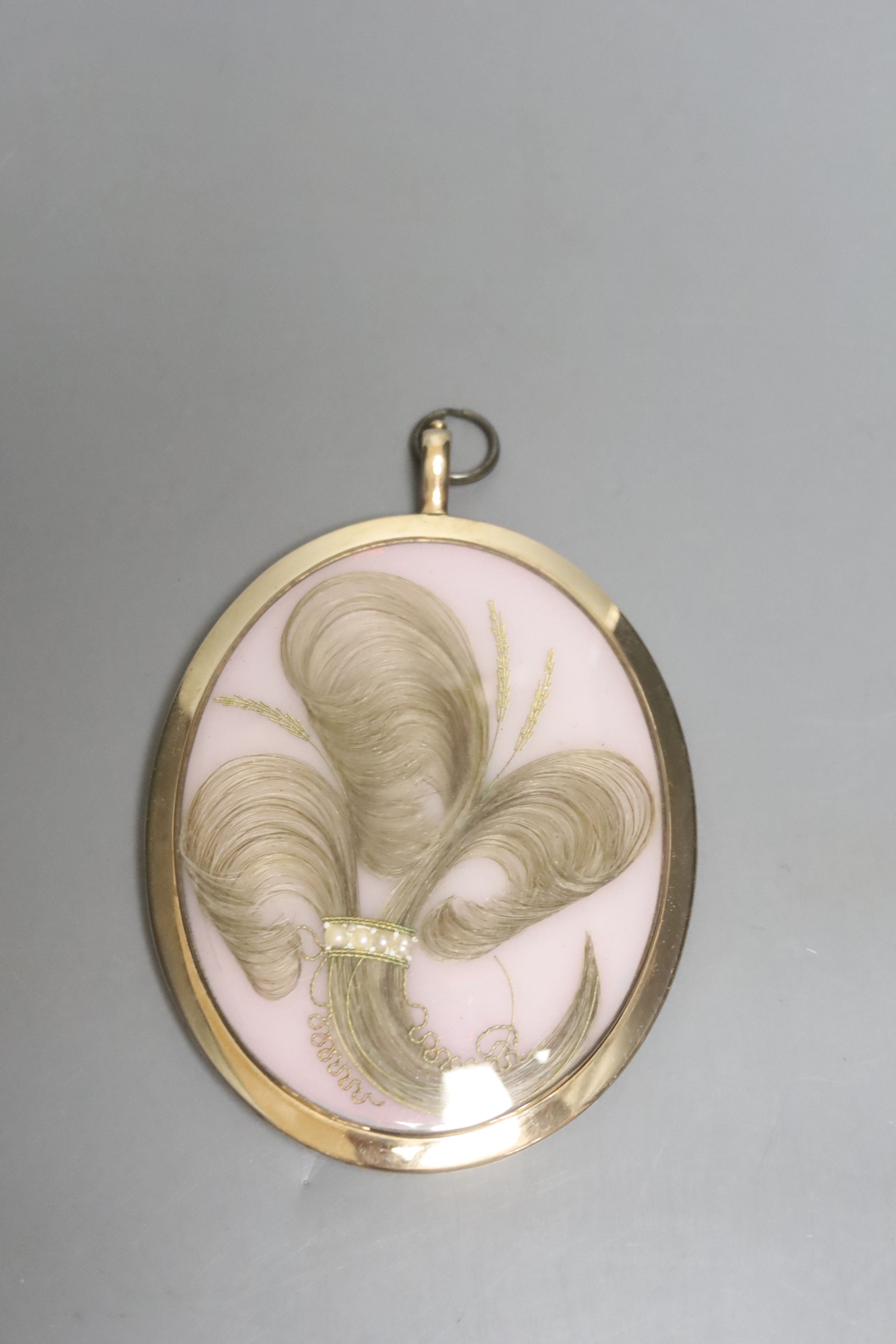 A portrait miniature on ivory of a lady by Charles Hayter, 1797; signed and dated, seed pearl tied hair back